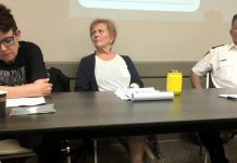 Whitepath Consulting and Counselling Services owner Peggy Shaughnessy (left) during a June 12th public meeting on Peterborough's opioid crisis at the Lions' Community Centre in Peterborough. As a frontline expert in drug overdose, treatment, and counselling, Shaughnessy was disappointed that she wasn't initally invited to participate on the panel for the July 11th 'Opioid Summit' being hosted by Peterborough Mayor Diane Therrien and Selwyn Deputy Mayor Sherry Senis. Following negative reaction from some members of the community, Mayor Therrien has now invited Shaughnessy to participate. Peterborough Deputy Police Chief Tim Farquharson (right) is already participating on the July 11th panel, which PARN executive director Kim Dolan (centre) will be moderating. (Photo: Paul Rellinger / kawarthaNOW)