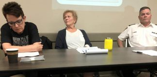 Whitepath Consulting and Counselling Services owner Peggy Shaughnessy (left) during a June 12th public meeting on Peterborough's opioid crisis at the Lions' Community Centre in Peterborough. As a frontline expert in drug overdose, treatment, and counselling, Shaughnessy was disappointed that she wasn't initally invited to participate on the panel for the July 11th 'Opioid Summit' being hosted by Peterborough Mayor Diane Therrien and Selwyn Deputy Mayor Sherry Senis. Following negative reaction from some members of the community, Mayor Therrien has now invited Shaughnessy to participate. Peterborough Deputy Police Chief Tim Farquharson (right) is already participating on the July 11th panel, which PARN executive director Kim Dolan (centre) will be moderating. (Photo: Paul Rellinger / kawarthaNOW)