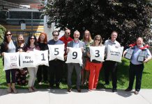 The 11th annual YWCA Walk a Mile in Her Shoes fundraiser, held on May 24, 2019, has raised $103,028 for the YWCA Crossroads Shelter, supporting 1,593 "Safe Nights" for women and children fleeing abuse. Pictured from left to right: Jocelyn Hill of Swish, Tiffany Christie of Heads up for Inclusion, Laura Leahy of Swish, YWCA executive director Lynn Zimmer, Scott Rocha of Swish, Drew Merrett of Merrett Home Hardware Building Centre, Dan Vilar of GM Financial, Monika Carmichael of Trent Valley Honda, Kelli Richard of Kawartha Credit Union, Chris Russell of Bryston, and top individual fundraiser Tom Mortlock of top fundraising team Mortlock Construction. (Photo courtesy of YWCA Peterborough Haliburton)