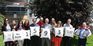 The 11th annual YWCA Walk a Mile in Her Shoes fundraiser, held on May 24, 2019, has raised $103,028 for the YWCA Crossroads Shelter, supporting 1,593 "Safe Nights" for women and children fleeing abuse. Pictured from left to right: Jocelyn Hill of Swish, Tiffany Christie of Heads up for Inclusion, Laura Leahy of Swish, YWCA executive director Lynn Zimmer, Scott Rocha of Swish, Drew Merrett of Merrett Home Hardware Building Centre, Dan Vilar of GM Financial, Monika Carmichael of Trent Valley Honda, Kelli Richard of Kawartha Credit Union, Chris Russell of Bryston, and top individual fundraiser Tom Mortlock of top fundraising team Mortlock Construction. (Photo courtesy of YWCA Peterborough Haliburton)