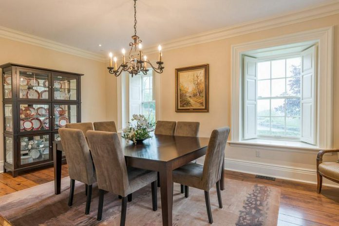 The remodelled formal dining room. High-quality maple and pine hardwood floors are featured throughout the home.