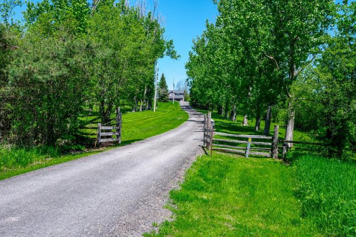 124 Lily Lake Road is a perfect home if you want the privacy, quietness, and tranquility of a rural location with all the luxurious amenities of modern living.