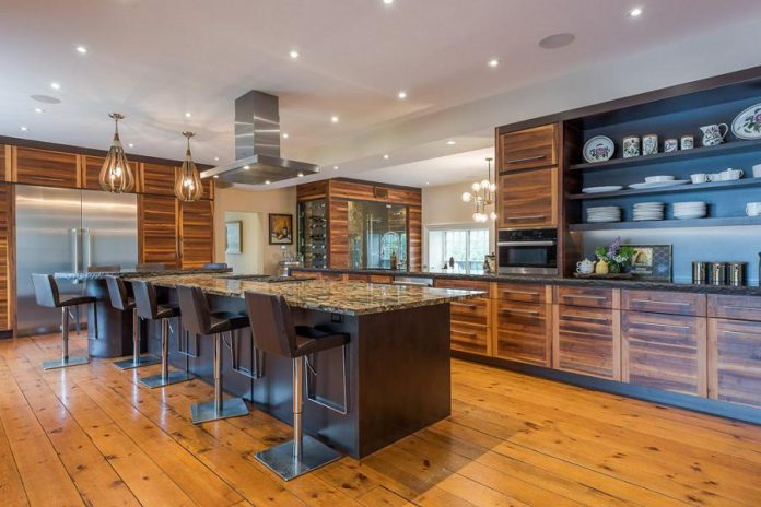 The contemporary multipurpose kitchen was designed with entertaining in mind, with the open-plan interior creating an easy flow between the dining room and family room.