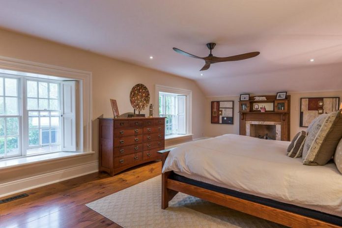 The master bedroom features a private walk-in dressing room, a middle-drawer island, and an ensuite bathroom.