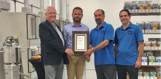Darren and Ryan Goldin of Etomo Farms in Norwood (right) receive an inaugural Excellence in Agriculture Award from Ontario Minister of Agriculture, Food and Rural Affairs Minister Ernie Hardeman and Northumberland-Peterborough South MPP David Piccini on July 4, 2019, in recognition of the company's innovation in producing food products from crickets. (Photo: Ontario Ministry of Agriculture, Food and Rural Affairs)
