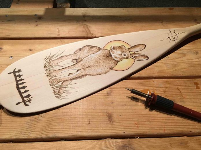 Make a one-of-a-kind woodburned paddle at an artisan workshop  on Saturday, August 17th at The Canadian Canoe Museum. (Photo courtesy of The Canadian Canoe Museum)