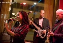 Charlene "Charlie" Earle performing with her quartet Little Fire in April 2014 at the former Barbeside Salon, with Aaron Cavon on bass and Dave Tough on guitar (not shown: Brandon Root on drums). Earle passed away on July 19, 2019 at the age of 33. (Photo: Esther Vincent / evmustang.ca)