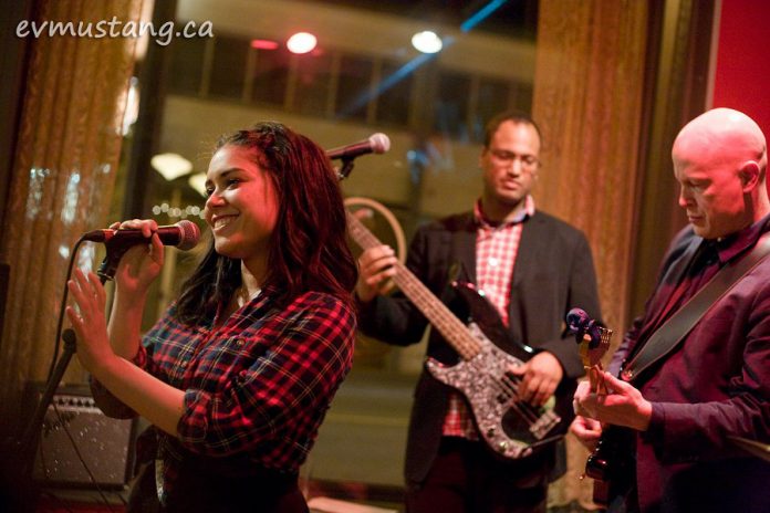 Charlene "Charlie" Earle performing with her quartet Little Fire in April 2014 at the former Barbeside Salon, with Aaron Cavon on bass and Dave Tough on guitar (not shown: Brandon Root on drums). Earle passed away on July 19, 2019 at the age of 33. (Photo: Esther Vincent / evmustang.ca)