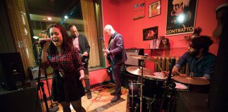 Charlene "Charlie" Earle belting out a tune with Little Fire in April 2014 at the former Barbeside Salon, with Aaron Cavon on bass, Dave Tough on guitar, and Brandon Root. Two celebrations of the life of Earle, who passed away suddenly at the age of 33, are taking place on July 27 and 28 in Peterborough. (Photo: Esther Vincent / evmustang.ca)