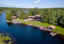 The Highlands Cottages, located at 3133 Peterborough County Road 36 in Buckhorn, is a spectacular place to live or to run a business like an Airbnb. The two-acre property on almost 700 feet of waterfront includes a 4,000-square-foot log home, two winterized log cabins, and a boathouse. (Photo: Darryl Griffioen, OneLook Productions)