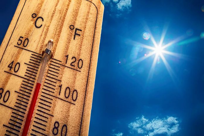 Hot thermometer with bright sun