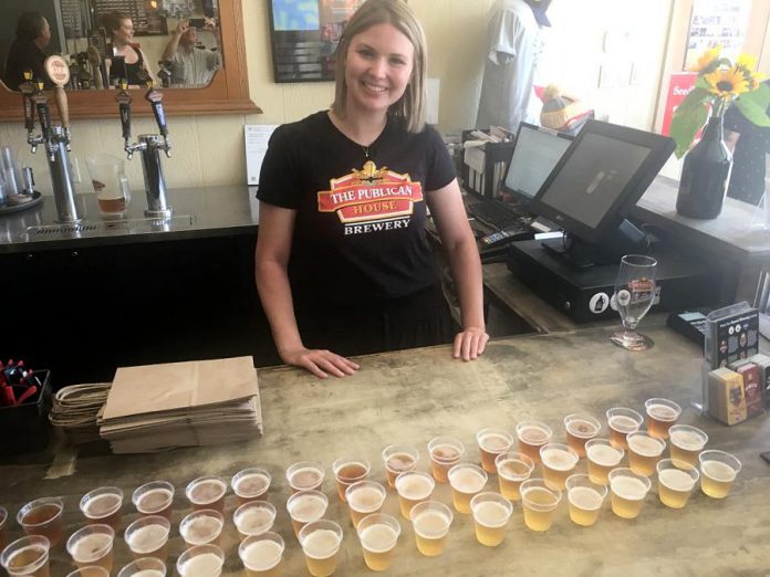 The first stop during the inaugural PedalBoro ride held on Tuesday (July 16) was at the Publican House Brewery, where Bailey Brown welcomed participants with a generous, and most appreciated, sampling of the brewery's products.  (Photo: Paul Rellinger / kawarthaNOW.com)