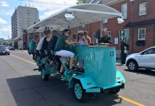 PedalBoro's 15-passenger party bike received a fair share of attention on Tuesday (July 16) during the bike tour company's inaugural downtown tour from The Olde Stone Brewing Company to the Publican House Brewery before heading to Millennium Park. (Photo: Paul Rellinger / kawarthaNOW.com)