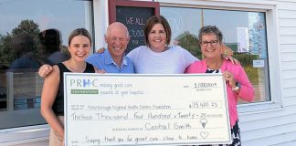 Central Smith Creamery owner Ian Scates (second from left) and vice-president/marketing Jenn Scates (right) present a cheque for $13,420.25 to Jane Lovett (left) and Lesley Heighway (second from right) of PRHC Foundation on August 1, 2019 at the dairy's location at 739 Lindsay Road in Peterborough. (Photo courtesy of PRHC Foundation)