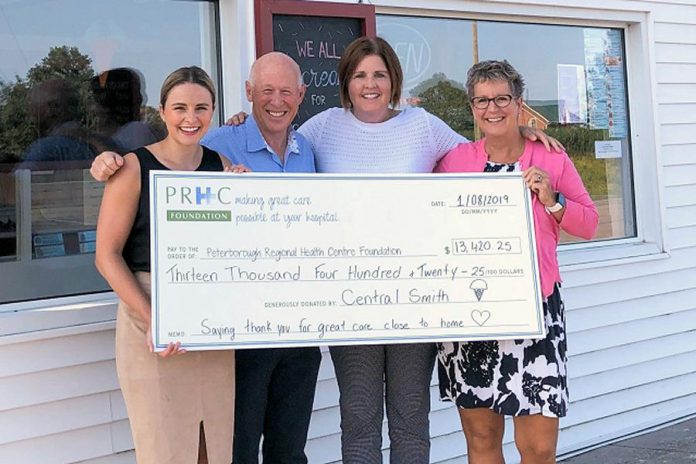 Central Smith Creamery owner Ian Scates (second from left) and vice-president/marketing Jenn Scates (right) present a cheque for $13,420.25 to Jane Lovett (left) and Lesley Heighway (second from right) of PRHC Foundation on August 1, 2019 at the dairy's location at 739 Lindsay Road in Peterborough. (Photo courtesy of PRHC Foundation)