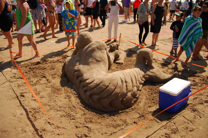 The back view of "Clown College Dropout", which won first place in the amateur competition's adult category during the Cobourg Sandcastle Festival on August 3, 2019 at Victoria Beach in the Town of Cobourg. (Photo: April Potter / kawarthaNOW.com)