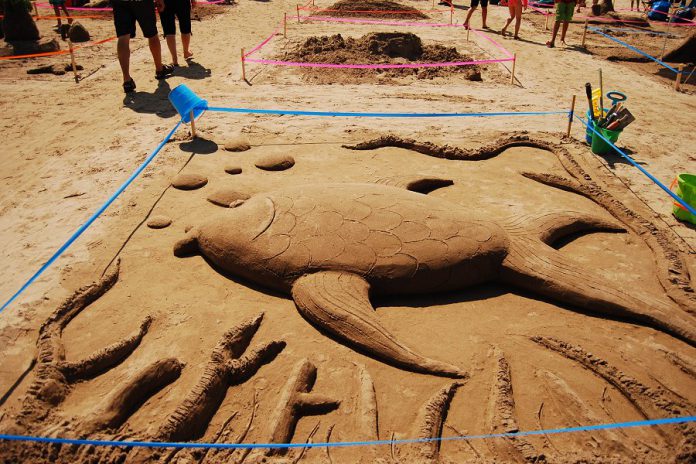 "The Good Diggers" won third place in the family category in the amateur competition at the Cobourg Sandcastle Festival on August 3, 2019 at Victoria Beach in the Town of Cobourg. (Photo: April Potter / kawarthaNOW.com)
