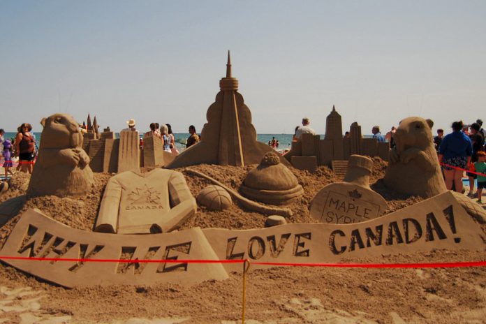 "Why We Love Canada" was the theme for master sculptors from Canada and the U.S. at the 14th annual Cobourg Sandcastle Festival, held on August 3, 2019 at Victoria Beach in the Town of Cobourg. The day also featured an amateur competition where public teams vyed for top prizes in five categories. (Photo: April Potter / kawarthaNOW.com)