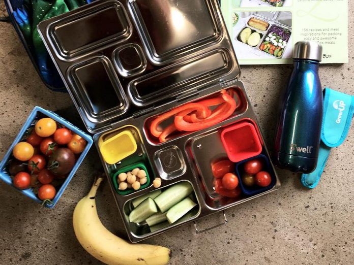 Stainless steel containers keep fresh food tasting its best, so there's no need to purchase unhealthy prepackaged snacks. And you can replace the disposable juice box with a reusable drink container filled with home-brewed fruit tea. (Photo: GreenUP)