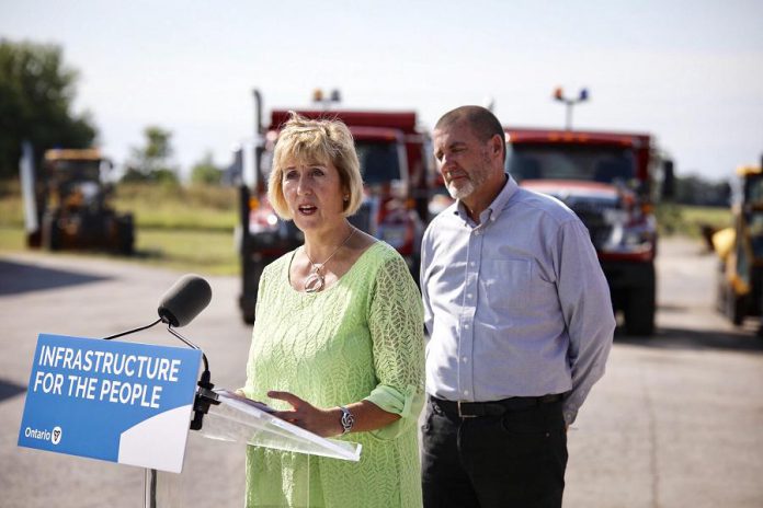 Ontario Minister of Infrastructure Laurie Scott announced $790,000 to help the municipality of Kawartha Lakes improve public transit on August 16, 2019 at Lindsay Transit's bus maintenance facility in Lindsay. Pictured in the background is Kawartha Lakes Mayor Andy Letham. (Photo: Office of Laurie Scott)