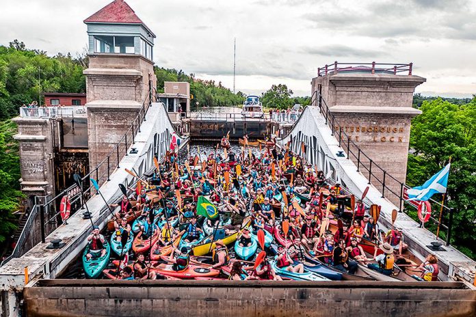 At last year's Lock and Paddle on June 24, 2019, the event tried to get as many paddlers as possible through the Peterborough Lift Lock in a single afternoon. This year's event takes place in the evening and organizers are encouraging participating paddlers to light up and decorate their canoes and kayaks.  (Photo: Parks Canada)