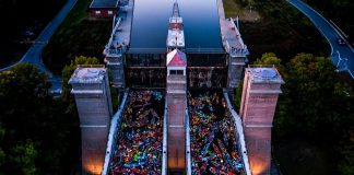 Decorated and lit canoes and kayaks fill the two tubs of the Peterborough Lift Lock during the annual Lock & Paddlee event on August 24, 2019. The fourth annual event, presented by the Peterborough Lift Lock National Historic Site of Canada (Parks Canada) in co-operation with The Canadian Canoe Museum, was held in the evening for the first time. (Photo: Justen Soule / Trent-Severn Waterway)