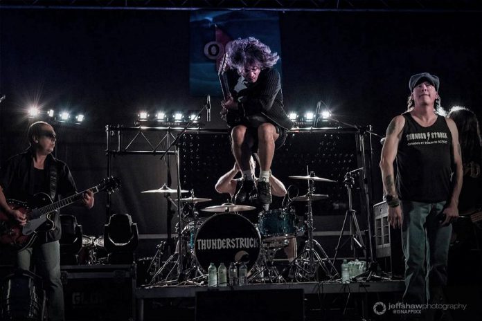 Toronto-based AC/DC tribute band Thunderstruck is performing at Peterborough Musicfest in Del Crary Park in downtown Peterborough on August 10, 2019. (Photo: Jeff Shaw / jeffshaw.ca)