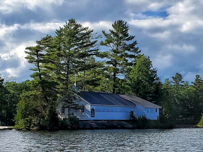 St. Peter's on-the-Rock, "the island church" on Stoney Lake, was built in 1914. As part of the church's final summer service at 10:30 a.m. on September 1, 2019, there will be a solemn remembrance of the victims of the boat crash on August 24th that claimed the lives of two 31-year-old men and injured four others. (Photo: Ward Strickland)