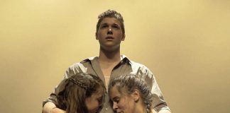 "Surfacing" is an original film from Frank Flynn, Rachel Bemrose, and Blake Richardson which, through spoken word and original music and choreography, tells the story of the mental illness of Flynn's wife Angela, her eventual suicide, and the impact on Flynn and their two daughters as they grieve and evenutally begin to heal. The film, which premiered at the 2017 ReFrame Film Festival, is available for online viewing. Pictured are dancers Oliver Moriarty, Kate Bemrose, and Madison Sheward. (Screenshot)