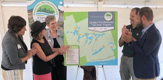 A map of the Trent-Severn Trail Town program, Canada's first waterway "trail town" program, was unveiled at a launch event on August 22, 2019 at Ranney Falls (Locks 11-12) in Campbellford. Pictured from left to right: Cycle Forward founder and trail town consultant Amy Camp, Northumberland-Peterborough South MP Kim Rudd, Kawarthas Northumberland/Regional Tourism Organization 8 (RTO8) Executive Director Brenda Wood, Parks Canada Associate Director for Ontario Waterways Dwight Blythe, and Northumberland-Peterborough South MPP David Piccini. (Photo courtesy of RTO8)