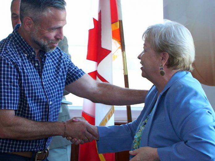 Community Futures Peterborough executive director Gail Moorhouse congratulates John Desbiens, president and CEO of Cambium Consulting & Engineering, the grand prize winner of the ignite100, an innovation competition launched in 2019 by Community Futures Peterborough where local businesses competed for a $100,000 loan, interest-free for the first three years with no payments for the first year. (Supplied photo)