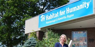 Habitat for Humanity Peterborough & Kawartha Region CEO Sarah Burke outside the organization's offices at 300 Milroy Drive in Peterborough. Habitat for Humanity Peterborough & Kawartha Region is launching its first-ever multi-residential project to construct a 41-unit affordable condo building in Peterborough, expanding the organization's efforts to provide affordable home ownership to low-income couples, singles, single-parent families, and seniors. (Photo: April Potter / kawarthaNOW.com)
