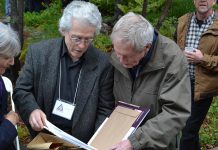 Renowned Canadian wildlife artists Michael Dumas and Robert Bateman in Algonquin Park at the 75th anniversary fundraiser for the Algonquin Wildlife Research Station on September 14, 2019, where Bateman was presented with the 2019 Algonquin Park Legacy Award by Dumas, the inaugural recipient of the award from the Algonquin Art Centre. Dumas also presented Bateman with a limited edition of "The Artists of Kawartha", the fourth art book in a series designed and published by Algonquin-area publisher Andrea Hillo. (Photo courtesy of Andrea Hillo)