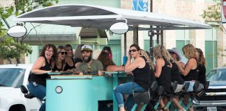The new Pedalboro party bike tours that allow participants to visit downtown Peterborough establishments via a 15-passenger bike is one example of cycle tourism. Downtown Peterborough, one of only five bike-friendly business areas in Ontario according to Ontario By Bike,is a natural location for bike-themed experiences. (Photo courtesy of Pedalboro)