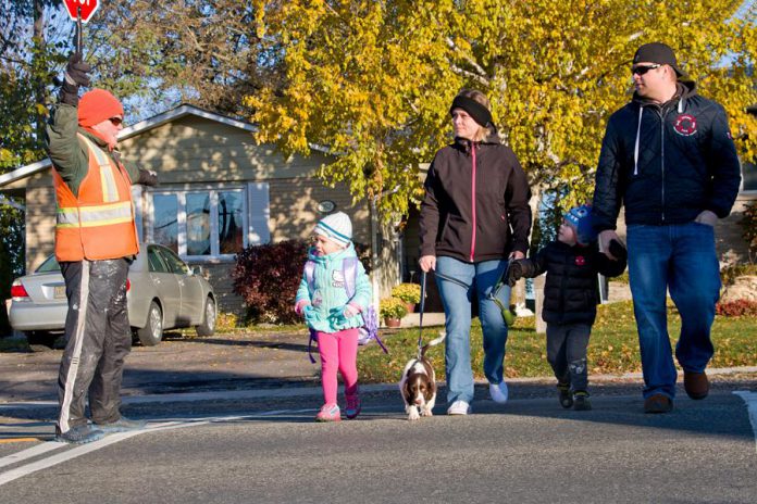 Active and Safe Routes to School Peterborough is challenging families to walk, bike, or bus to and from school this year. Planning ahead to make time for disruptions as you walk with your kids can make time for meaningful family moments and new relationships with neighbours and crossing guards. (Photo courtesy of GreenUP)