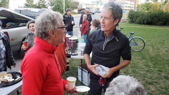 Chef Guenther Schubert, who will ensure everyone stays well-fed during their seven-week journey from Peterborough to Mexico, speaks with Tim Haines, one of the two inaugural runners. Haines is the husband of Monarch Ultra co-founder Carlotta James and the owner of Bluestreak Records. The second inaugural runner is James' best friend Krystal LeBreton.  (Photo: Jeannine Taylor / kawarthaNOW.com)