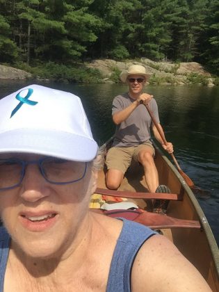 Paul Plant canoeing with his wife Karen Hoffman, who is wearing a Ovarian Cancer Canada Walk of Hope hat. Hoffman, a long-time teacher with the KPR School Board and a volunteer with St. James Players, was diagnosed with ovarian cancer in 2016. She participated in her first Ovarian Cancer Canada Walk of Hope in 2018, and passed away from the cancer in July 2019. Plant is participating in the 2019 Walk of Hope in memory of his late wife.  (Photo: Karen Hoffman)