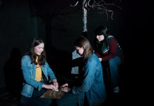 In Planet 12 Productions' original play "Tex", Samuelle Weatherdon, Aimee Gordon, and Emily Keller star as three girls who use an Ouija board on Halloween and contact a spirit who calls himself Tex and leads the girls into a local cemetery in search for the answers to a gruesome murder from their town's past. The show runs from September 25 to 28, 2019 at The Theatre on King in downtown Peterborough. (Photo: Andy Carroll)