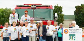 The Minds in Motion Cobourg team, representing people living with dementia and their families, raised $16,000 for the Alzheimer Society of Peterborough, Kawartha Lakes, Northumberland and Haliburton during the agency's annual Pulling for Dementia fundraiser, held on September 13, 2019 at the Peterborough Memorial Centre. Minds in Motion was one of 13 teams that pulled a 44,000-pound fire truck, with the Covia Corp's Mighty Miners pulling the truck the fastest at 15.74 seconds. The fifth annual event raised a total of $34,000 for local programs and services for people living with dementia. (Photo courtesy Alzheimer Society of Peterborough, Kawartha Lakes, Northumberland and Haliburton)