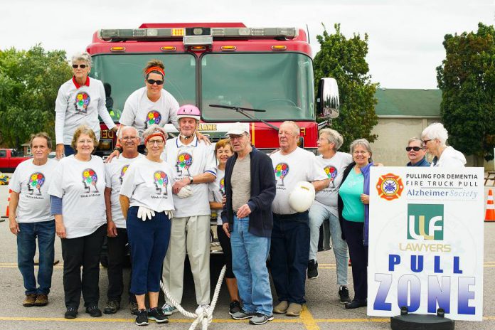 The Minds in Motion Cobourg team, representing people living with dementia and their families, raised $16,000 for the Alzheimer Society of Peterborough, Kawartha Lakes, Northumberland and Haliburton during the agency's annual Pulling for Dementia fundraiser, held on September 13, 2019 at the Peterborough Memorial Centre. Minds in Motion was one of 13 teams that pulled a 44,000-pound fire truck, with the Covia Corp's Mighty Miners pulling the truck the fastest at 15.74 seconds. The fifth annual event raised a total of $34,000 for local programs and services for people living with dementia. (Photo courtesy Alzheimer Society of Peterborough, Kawartha Lakes, Northumberland and Haliburton)