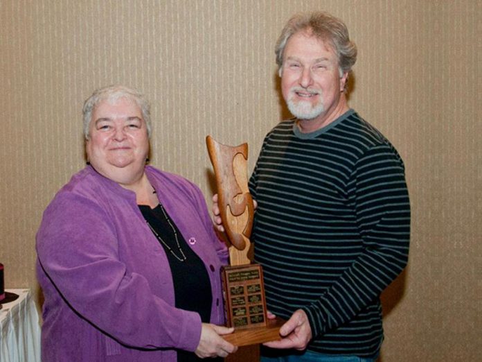 Terry Novak receiving an award for Acting Excellence in 2012 from the Eastern Ontario Drama League for his role in the Peterborough Theatre Guild production of "The Mouse House". (Photo: Peterborough Theatre Guild)