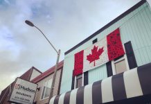 Hospice volunteers have hand crafted this large Canadian flag of poppies, which is hanging at Vintage on Hastings, the shop operated in downtown Bancroft by Hospice North Hastings. In previous years, hospice volunteers have used their skills for other large-scale projects to commemorate Remembrance Day. (Photo: Barb Shaw)