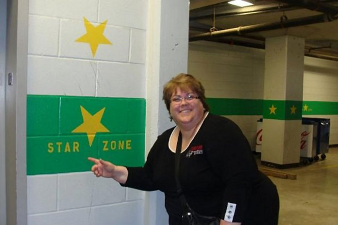 Peterborough Pop Ensemble artistic director Barbara Monahan at the Rogers Centre in Toronto in September 2009, when the group performed the national anthem at a Toronto Blues Jay game. (Photo courtesy of Peterborough Pop Ensemble)