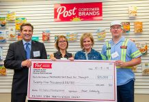 Northumberland Food for Thought community development coordinator Beth Kolisny and public health dietician Kimberly Leadbeater accept a cheque for $25,000 from Post Consumer Brands on October 15, 2019 in Cobourg. (Photo: Haliburton, Kawartha, Pine Ridge District Health Unit / Facebook)