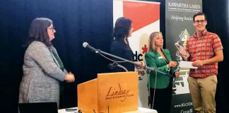 Dan Kitchen of Servo Socks (right) accepting the grand prize from Dawn Hennessey of the Business Development Bank of Canada at the Kawartha Lakes Small Business Innovation Awards in Lindsay on October 25, 2019. (Photo: Servo Socks / Facebook)