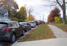 A common sight at Peterborough-area schools during drop-off and pick-up times: a long line of idling cars on Robinson Street beside Immaculate Conception Catholic Elementary School in Peterborough's East City. Empty sidewalks are an indication that there is potential to shift towards active methods of school travel instead of relying on cars. Relying on cars for school travel reduces air quality, physical activity, and opportunities for independence while also increasing social isolation. To help address these issues, Immaculate Conception is one of five local schools participating in the new School Travel Planning program delivered by GreenUP and Active and Safe Routes to School Peterborough. (Photo courtesy of GreenUP)