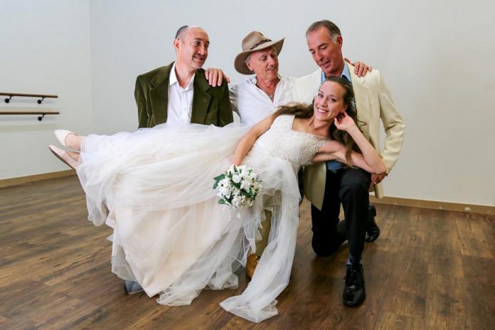 In the St. James Players' production of "Mamma Mia!", Sophie Sheridan (Gillian Harknett) invites the three men who might be her father -- Harry Bright (Keevin Carter), Bill Austin (Mark Gray), and Sam Carmichael (Warren Sweeting) -- to her wedding on a Greek island. (Photo courtesy of St. James Players)