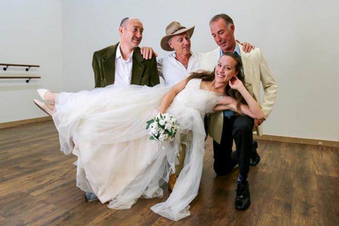 In the St. James Players' production of "Mamma Mia!", Sophie Sheridan (Gillian Harknett) invites the three men who might be her father -- Harry Bright (Keevin Carter), Bill Austin (Mark Gray), and Sam Carmichael (Warren Sweeting) -- to her wedding on a Greek island.  (Photo courtesy of St. James Players)