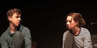 Chris Whidden and Peyton Le Barr as adopted siblings Aaron and Claire during a rehearsal for the Peterborough Theatre Guild's production of "Little One" by Hannah Moscovitch. Directed by Lee Bolton, the one-act play is a dark family drama that raises complex questions about good intentions, irreversible damage, and the nature of love. It runs for five performances from October 16 to 19, 2019. (Photo courtesy of Lee Bolton)