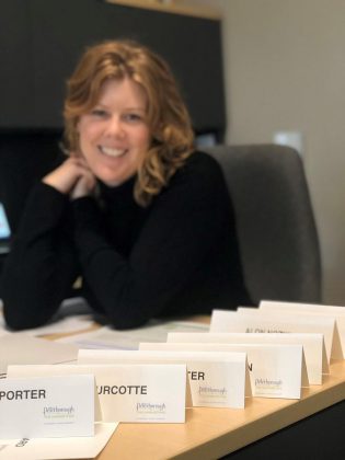 Madeleine Hurrell, Entrepreneurship Officer at Peterborough & the Kawarthas Business Advisory Centre, smiles from her office as the 2019 Starter Company Plus Fall program participants are announced on Friday, October 11, 2019. This year, 10 businesses from Peterborough & the Kawarthas are taking part in a seven-week program that will teach them the necessary skills to start and grow their business. (Photo: Alyssa Cymbalista)